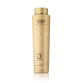 A tall, slender bottle of FAIR & WHITE Gold Rejuvenating Moisture Lotion with a gold-colored label and cap, displayed against a white background.